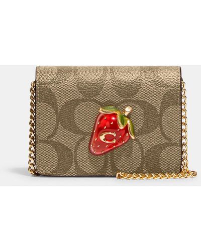 COACH Mini Wallet On A Chain In Signature Canvas With Strawberry - Natural