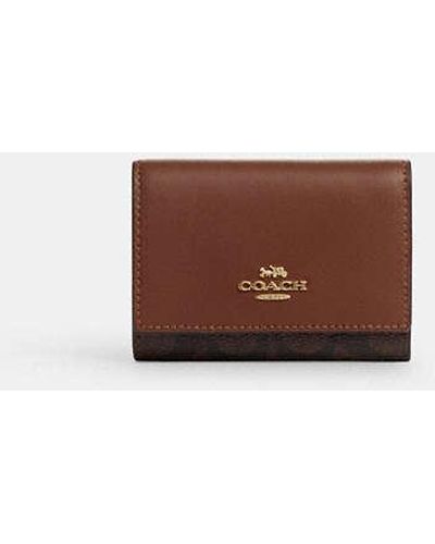 COACH Micro Wallet In Signature Canvas - Brown