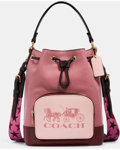 COACH Jes Drawstring Bucket Bag In Colorblock With Horse And Carriage - Pink
