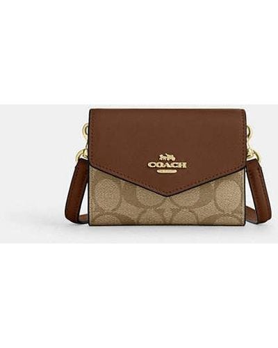 COACH Mini Envelope Wallet With Strap In Signature Canvas - Brown