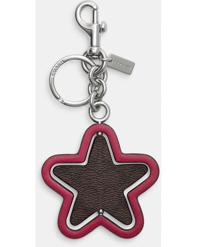 COACH Spinning Star Bag Charm In Signature Canvas - White