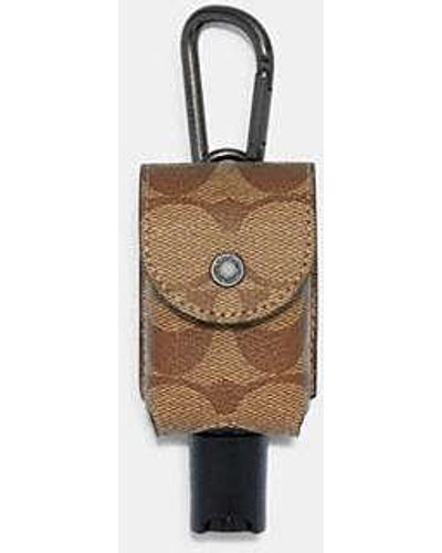 COACH Hand Sanitizer Holder In Signature Canvas - Natural