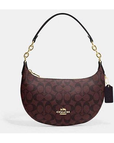 COACH Payton Hobo In Signature Canvas - Brown