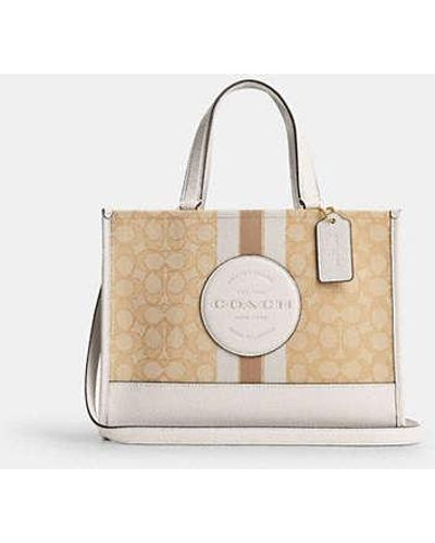 COACH Dempsey Carryall Bag In Signature Jacquard With Stripe And Coach Patch - Natural