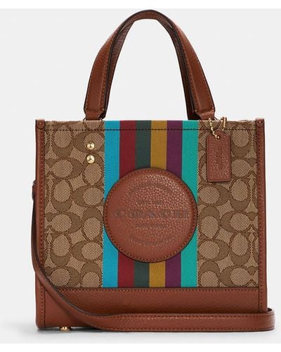 COACH Dempsey Tote 22 In Signature Jacquard With Stripe And Coach Patch - Brown