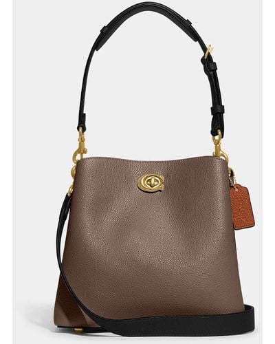 Small town cloth handbag Coach Brown in Cloth - 42267466