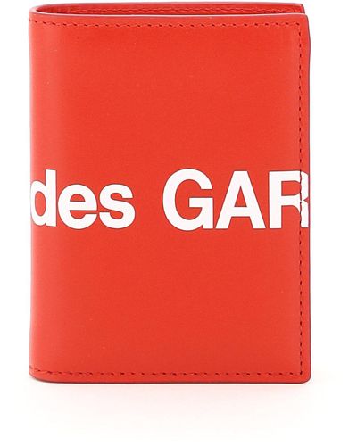 Comme des Garçons Portafoglio Comme des garcons portafoglio bifold piccolo con logo enorme - Rosso