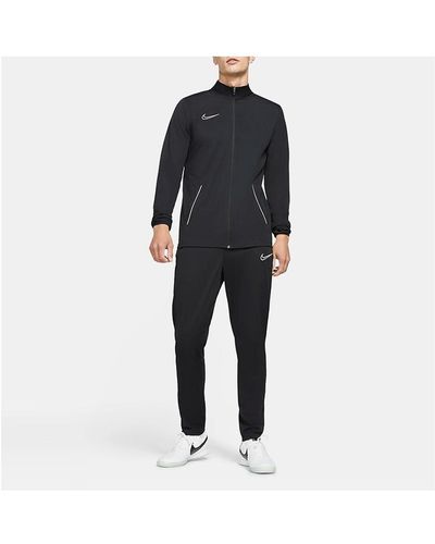 Black Nike Tracksuits and sweat suits for Men | Lyst