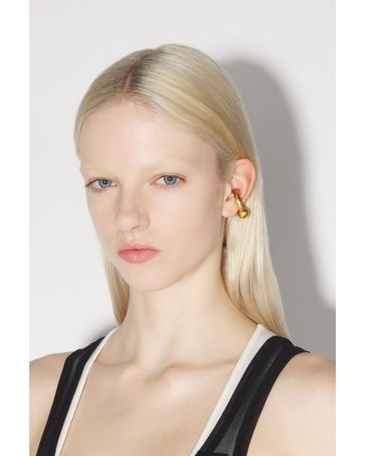 Jean Paul Gaultier The Gold-tone Piercing Earring Golden In Brass - Natural