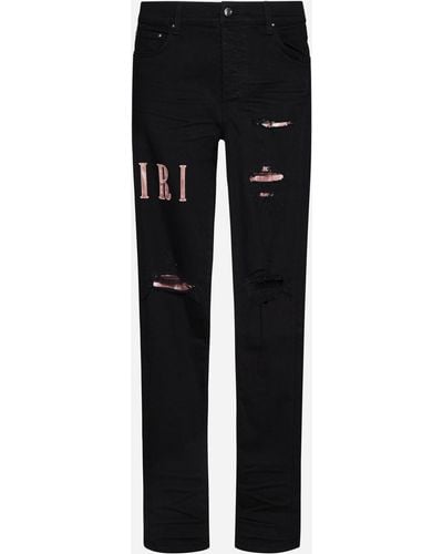 Amiri Tie-dye Logo Skinny Jeans - Black