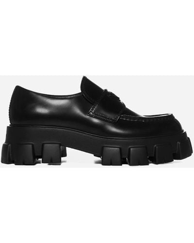 Prada Monolith Logo-embellished Brushed Leather Loafers - Black