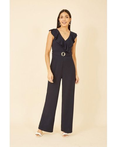 Mela Navy Jumpsuit With Gold Buckle And Frill Detail - Natural