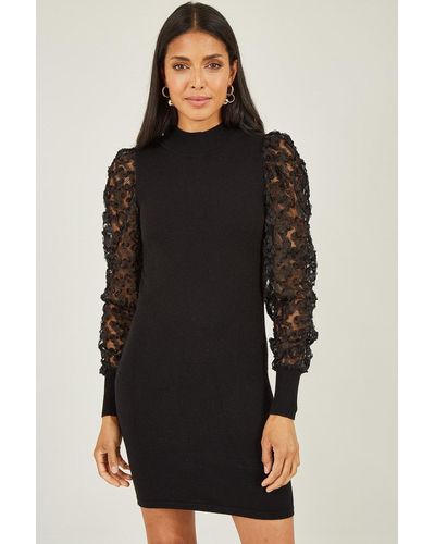 Mela Black Fitted Knitted Dress With Mesh Sleeve