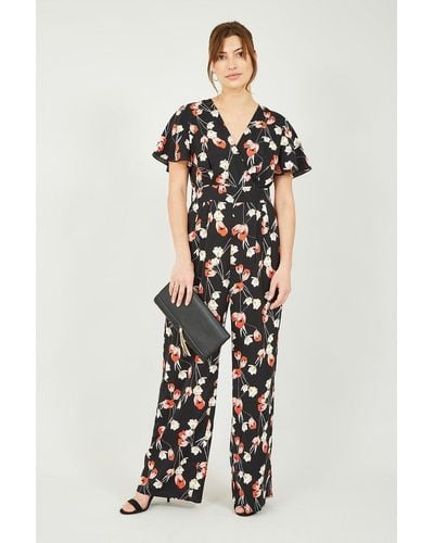 Yumi' Floral Jumpsuit With Angel Sleeves In Black