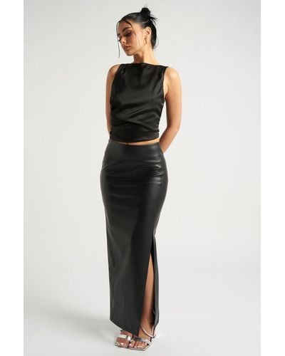 https://cdna.lystit.com/400/500/tr/photos/debenhams/3cbf63f1/urban-bliss-Black-Maxi-Side-Split-Pu-Skirt.jpeg