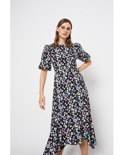 Warehouse Midi Dress With Dip Hem In Floral - White