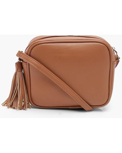 Boohoo Pu Zip Around Crossbody Bag With Tassel - Brown