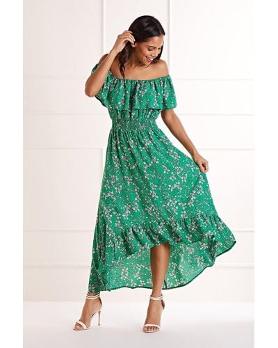 Mela Green Ditsy Print Bardot Dipped Hem Dress