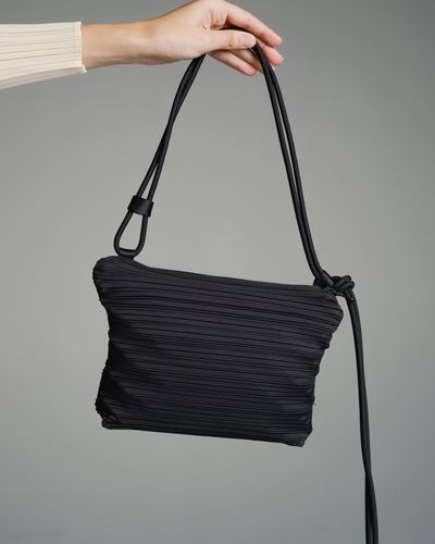Women's Pleats Please Issey Miyake Shoulder bags from $196 | Lyst