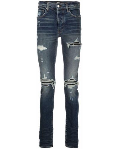 Amiri Jeans skinny con effetto vissuto MX1 - Blu