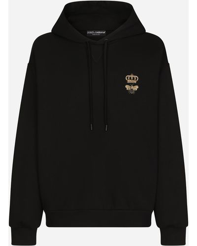 Dolce & Gabbana Sweat-shirt en jersey de coton à capuche et broderie - Noir