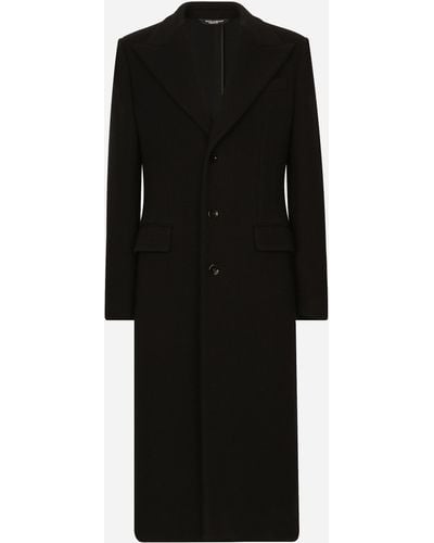Dolce & Gabbana Manteau droit en jersey de laine technique - Noir