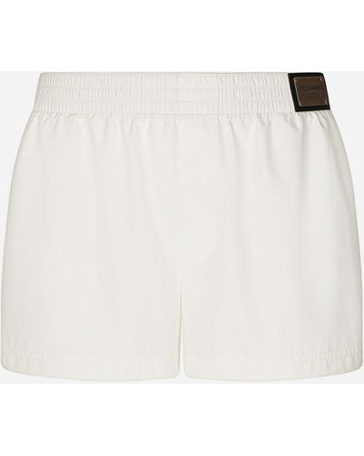 Dolce & Gabbana Short swim trunks with branded tag - Bianco