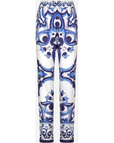 Dolce & Gabbana Pantalon en sergé de soie à imprimé majoliques - Bleu