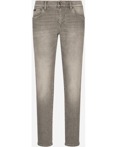 Dolce & Gabbana Jeans Slim aus grauem Stretchdenim