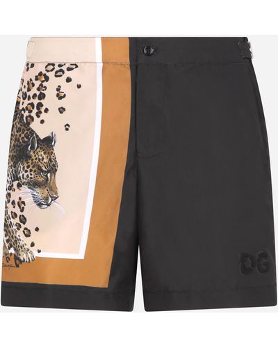 Dolce & Gabbana Short de bain mi-long à imprimé léopards et logo DG - Multicolore