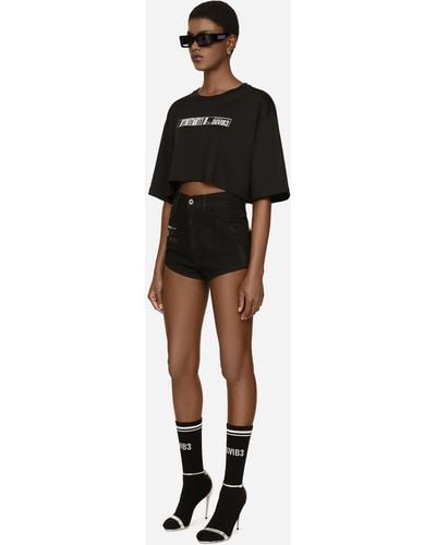 Dolce & Gabbana Shorts en denim de algodón con detalles rotos - Negro