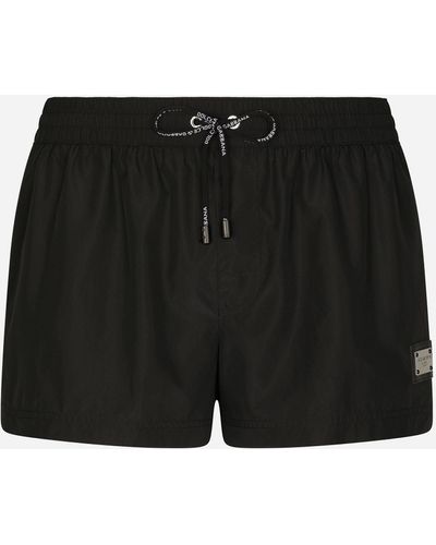 Dolce & Gabbana Boxer da mare corto con placchetta logata - Nero