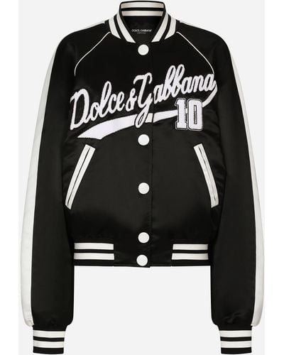 Dolce & Gabbana College-Bomberjacke aus Satin mit Dolce&Gabbana-Stickerei - Schwarz