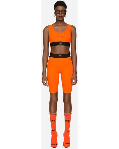 Dolce & Gabbana Pantalón corto tipo ciclista de punto indesmallable con banda elástica - Naranja