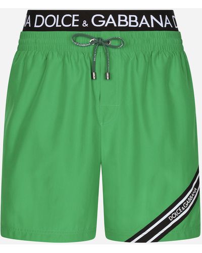 Dolce & Gabbana Mid-length swim trunks with branded band - Verde