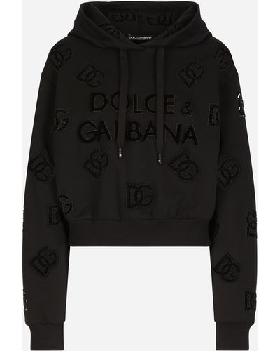 Dolce & Gabbana Sweatshirt aus Jersey mit Cut-out-Stickerei DG-Logo - Schwarz