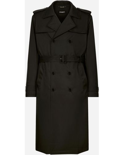 Dolce & Gabbana Zweireihiger Trenchcoat aus Nylon - Schwarz