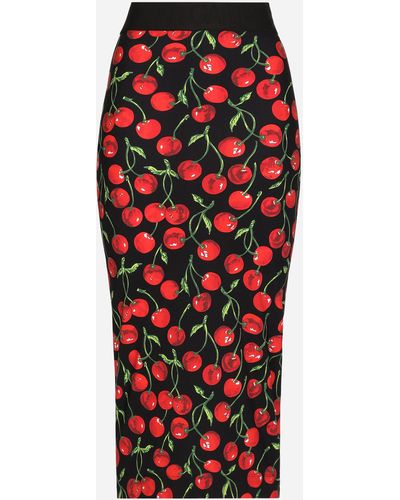 Dolce & Gabbana Falda longuette de punto técnico con logotipo en elástico y estampado de cerezas - Rojo