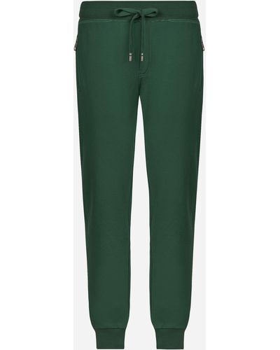 Dolce & Gabbana Pantalone jogging in jersey con placca logata - Verde