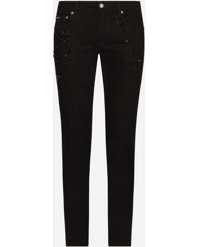 Dolce & Gabbana Jean skinny stretch avec strass brodés - Noir