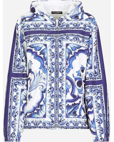 Dolce & Gabbana Windjacke Majolika-Print mit Kapuze - Blau