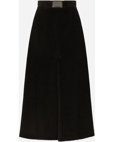 Dolce & Gabbana Longue jupe évasée en velours côtelé avec plaquette à logo - Noir