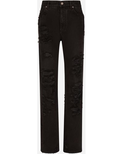 Dolce & Gabbana Ausgestellte Jeans aus Denim mit Rissen - Schwarz