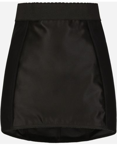 Dolce & Gabbana Minifalda corsetera de marquisette y encaje - Negro