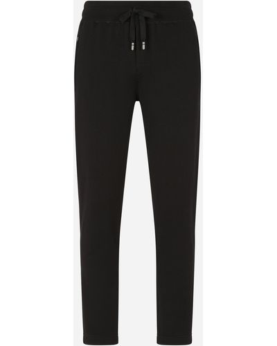 Dolce & Gabbana Jersey jogging pants with branded plate - Schwarz