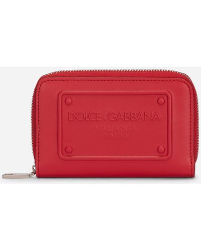 Dolce & Gabbana Portefeuille à contour zippé petit format en cuir de veau avec logo en relief - Rouge