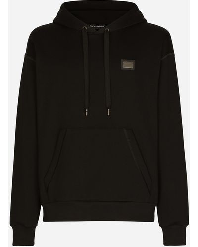 Dolce & Gabbana Sweat-shirt en jersey avec capuche et plaquette à logo - Noir