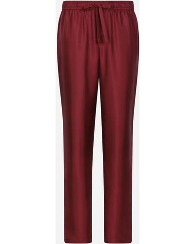 Dolce & Gabbana Pantalon de jogging en soie à écusson broderie DG - Rojo