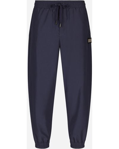 Dolce & Gabbana Pantalone jogging nylon con placca logata - Blu