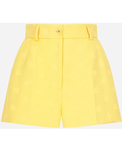 Dolce & Gabbana Jacquard Shorts With All-over Dg Logo - Yellow